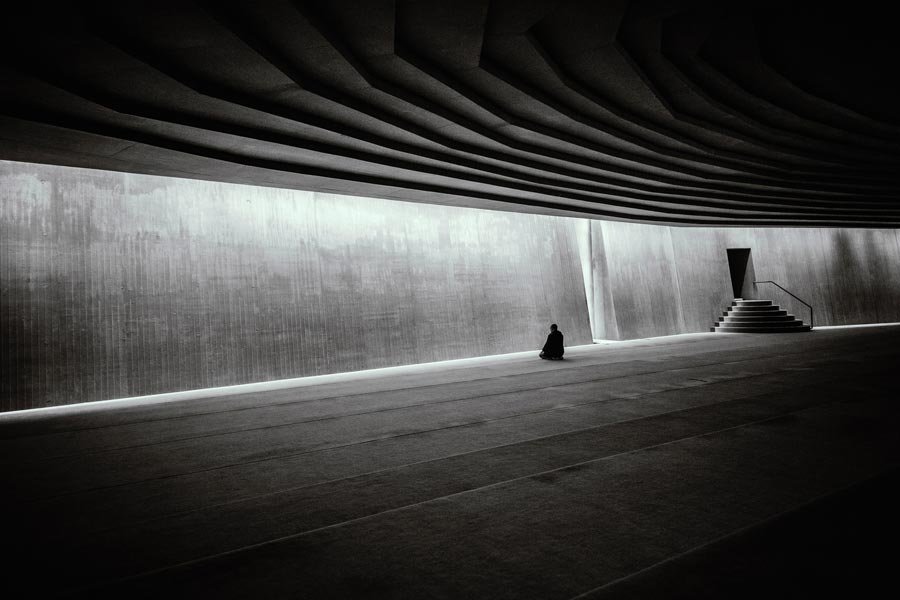 No Sense of Belonging Without Religion, Monk Sitting in an Empty Tunnel