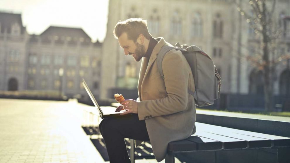 Best Jobs for Digital Nomads: Picture of a Guy Working Outside